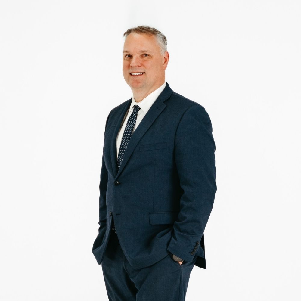 A professional headshot of David Stevens